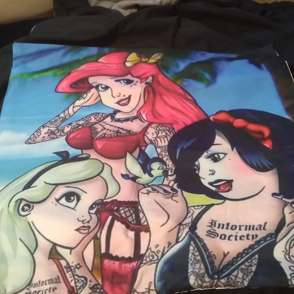 New set of 2 tattooed Disney princess pillow cases.